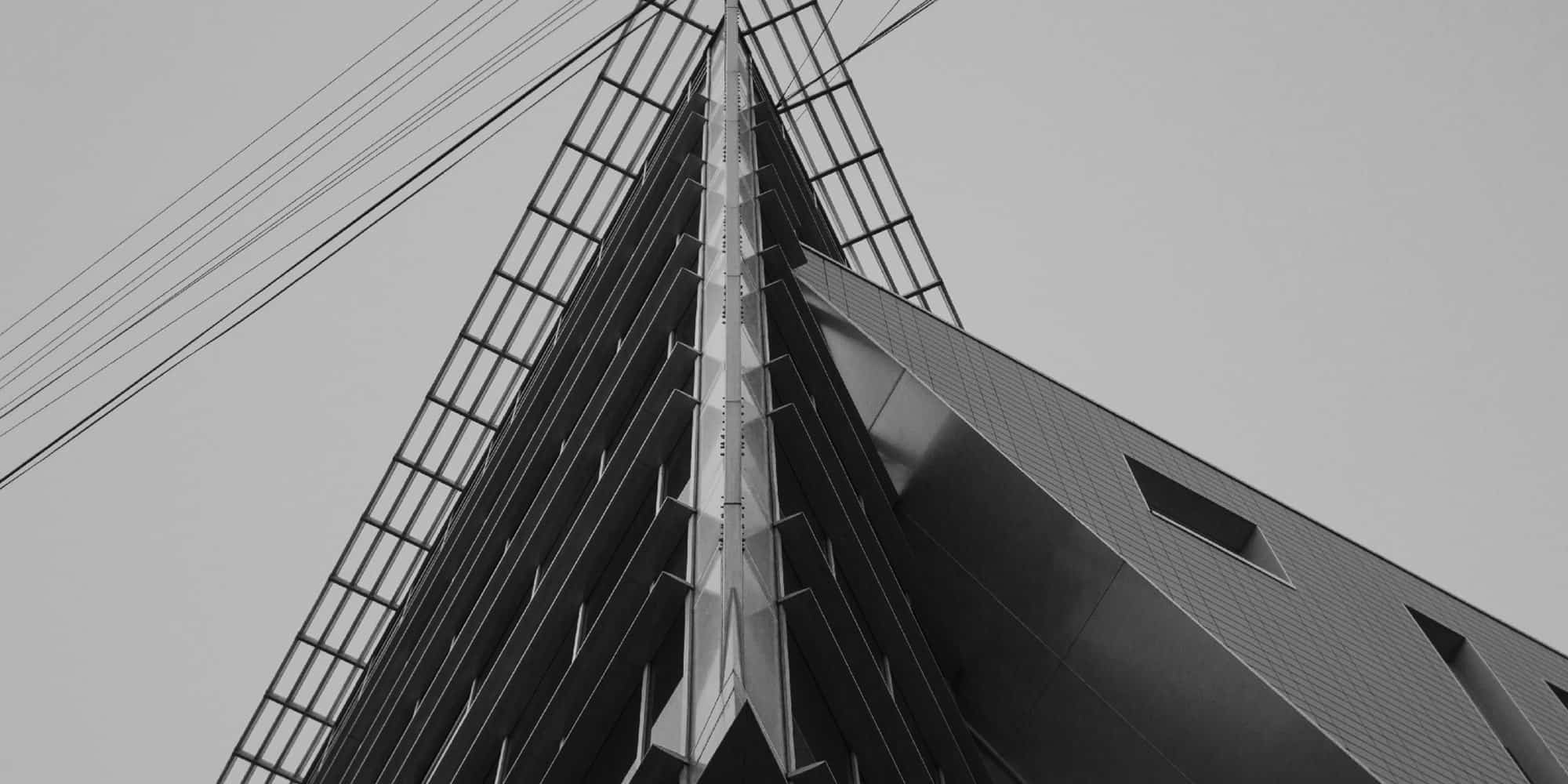A black and white photo of a tall building.