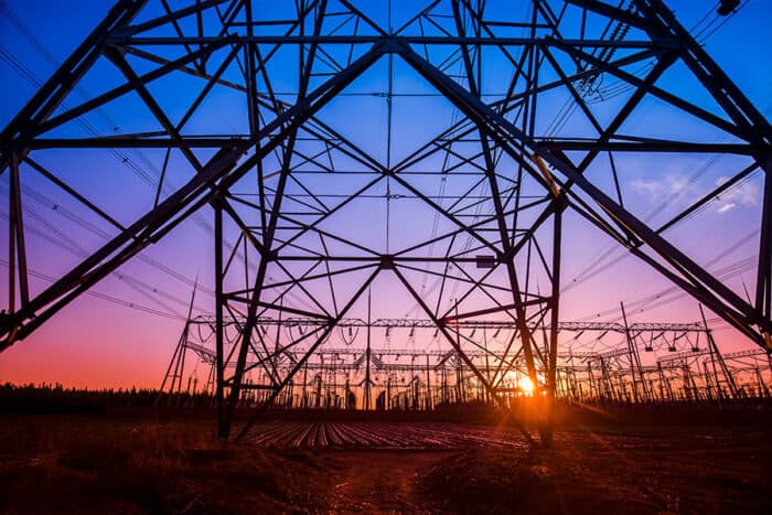 Closeup of transmission towers and power lines